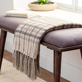 Hand-woven Barke Throw in natural beige with tassel accents