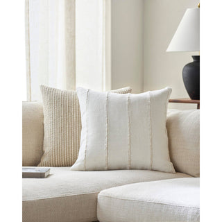 Charleston Lumbar Pillow displayed on a modern armchair in a living room setting