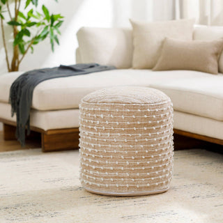 Handwoven Imani Pouf in natural beige with intricate diamond pattern, ideal for adding a boho touch to any space