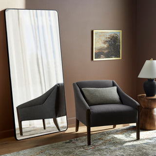 Large Aranya Full Length Mirror RAY-042 in white frame leaning against wall with bright natural light and potted plants